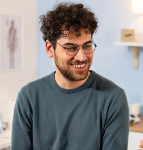 A young man at an STI clinic, being tested for HIV after an exposure.