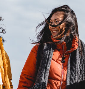 Two women getting exercise outdoors as part of their New Year's resolutions.