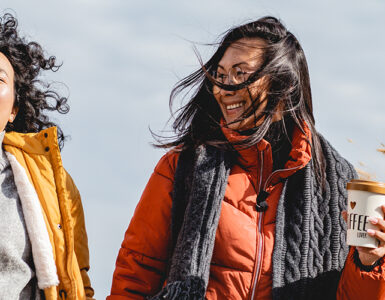 Two women getting exercise outdoors as part of their New Year's resolutions.