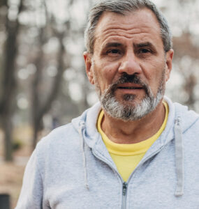 Older man with beard jogging