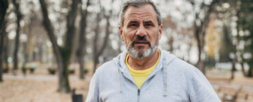 Older man with beard jogging