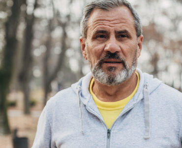 Older man with beard jogging