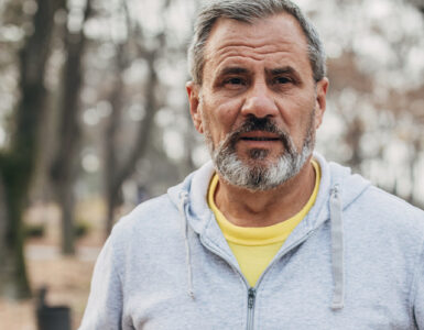 Older man with beard jogging