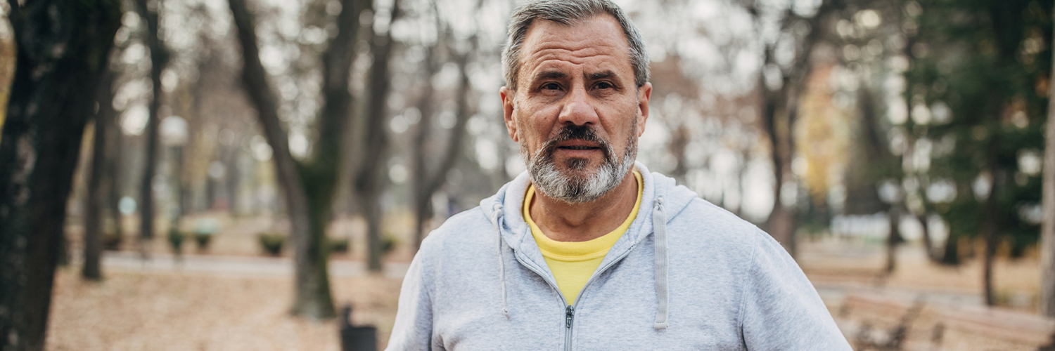 Older man with beard jogging