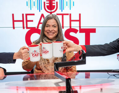 Three experts from Stony Brook Children's Hospital in the podcast studio holding coffee mugs.