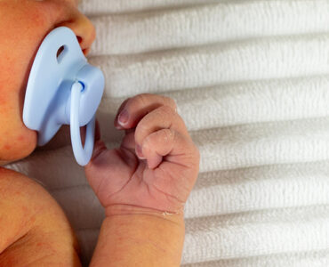 White newborn baby with jaundice.