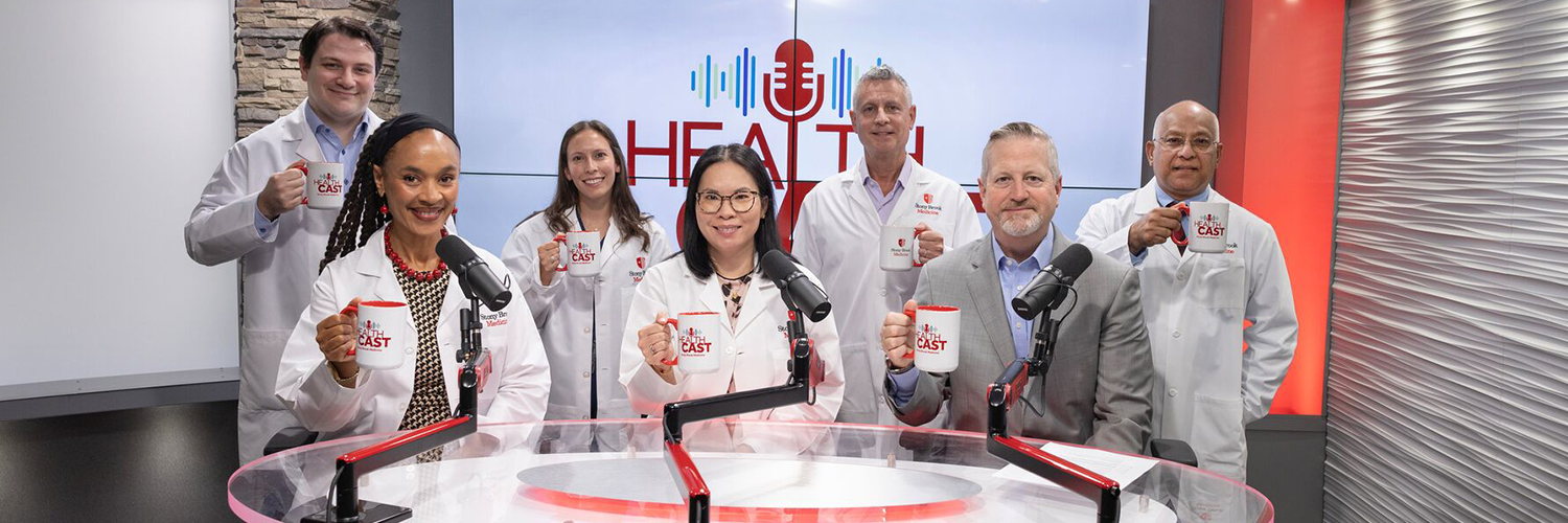 Experts from Stony Brook Medicine together in the podcast studio, holding branded coffee mugs.