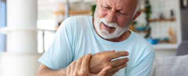 Elderly man has pain in fingers and hands, suggestive of radiculopathy.